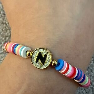 NWT Bracha Rainbow Initial N Beaded Vinyl Stretch Bracelet